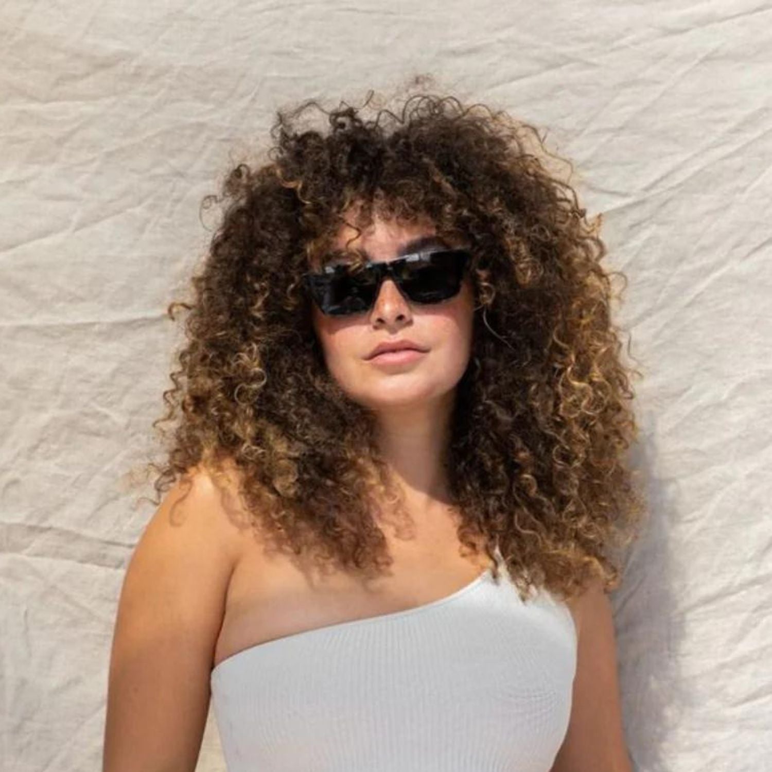 visible:Kyera has a square face shape, med width, med nose bridge:black #color_Midnight Tortoise with Gray Nylon Non-polarized Lenses