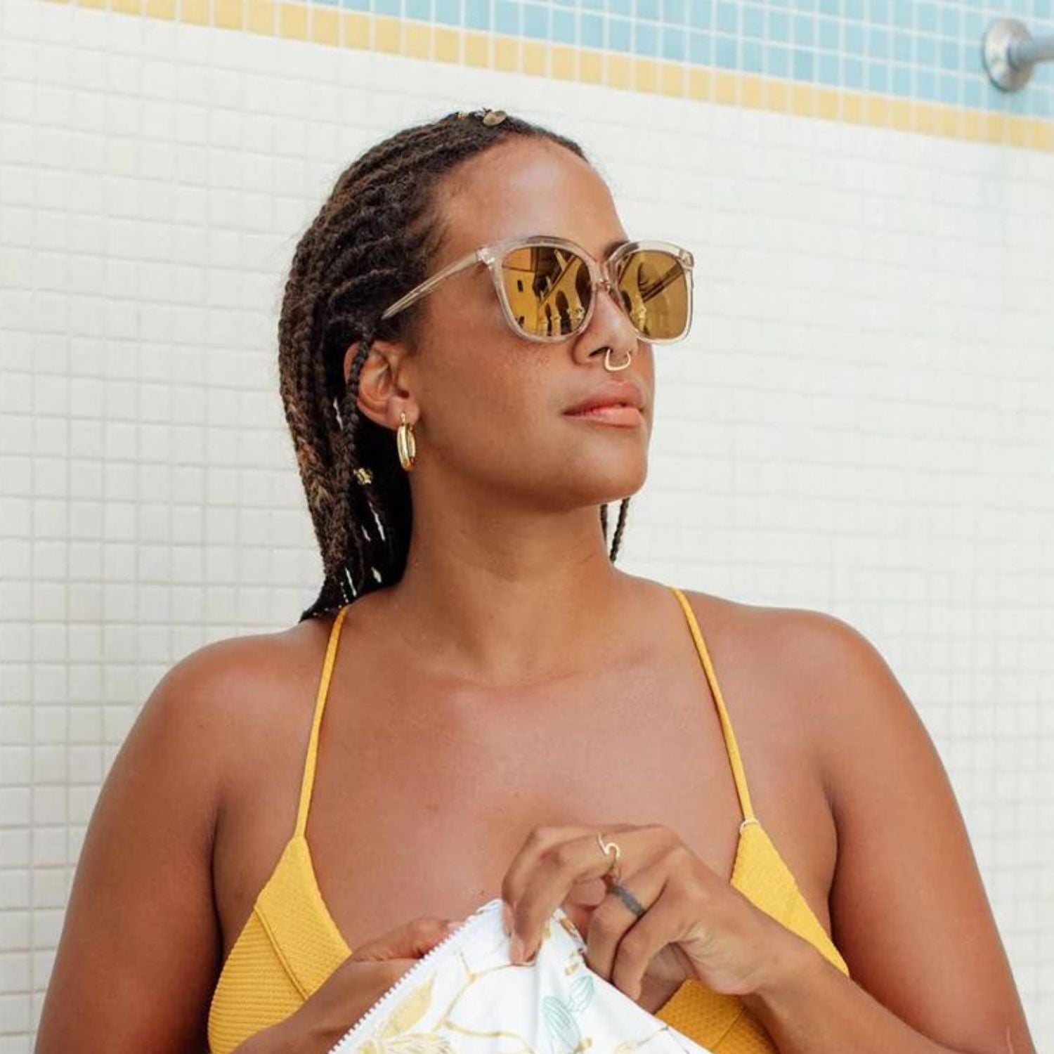 visible:Brennan has an oval face, med nose bridge and face width, deep skin with warm undertones:black #color_Lychee Soda with Gold Mirrored Lens