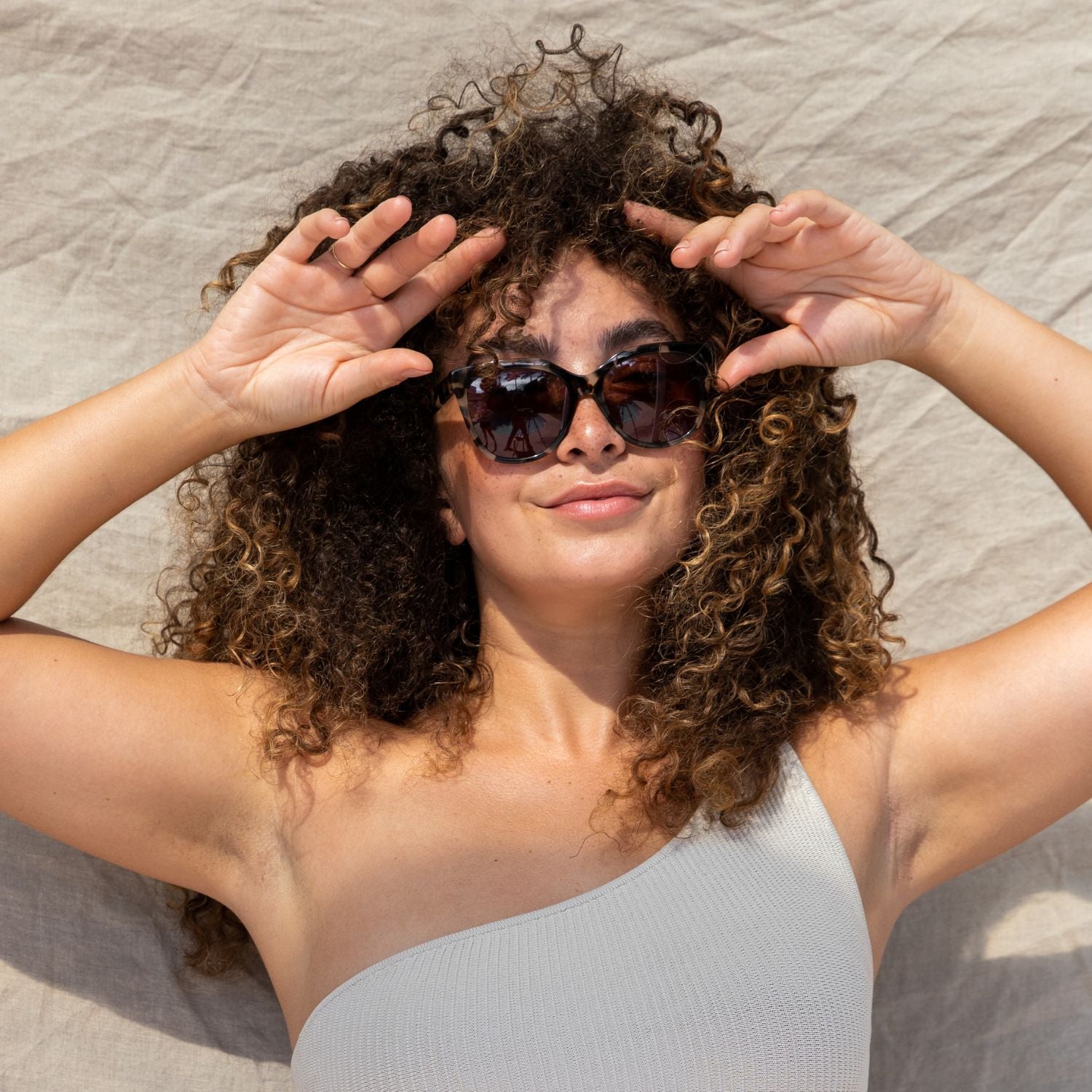 visible:Kyera has a square face shape, med width, med nose bridge:black #color_Havana Tortoise with Polarized Tan Lenses