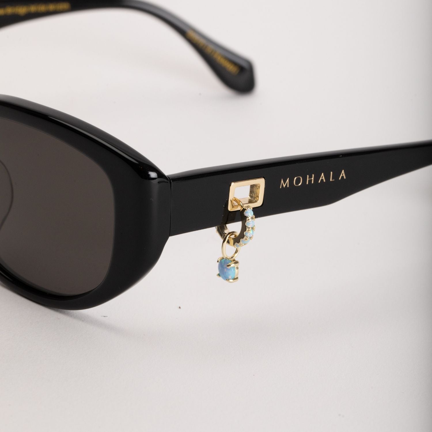 Opal Huggie by Misha Hawaii