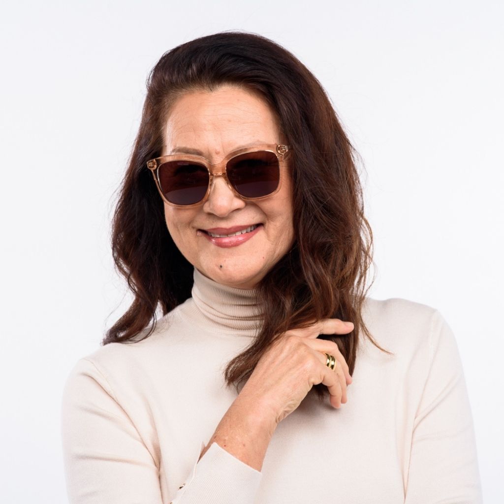 visible:Kanoe has a square face, low nose bridge, med face width, light skin with warm undertones:black #color_Guava Mimosa with Polarized Tan Lens