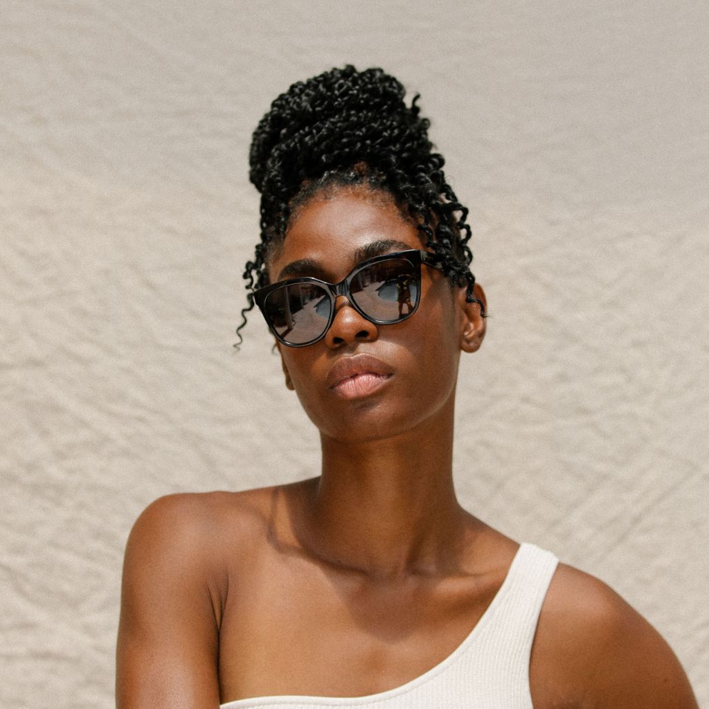 visible:Channel has a oval face shape, wide face width, low nose bridge:black #color_Kukui Tortoise with Polarized Tan Lenses