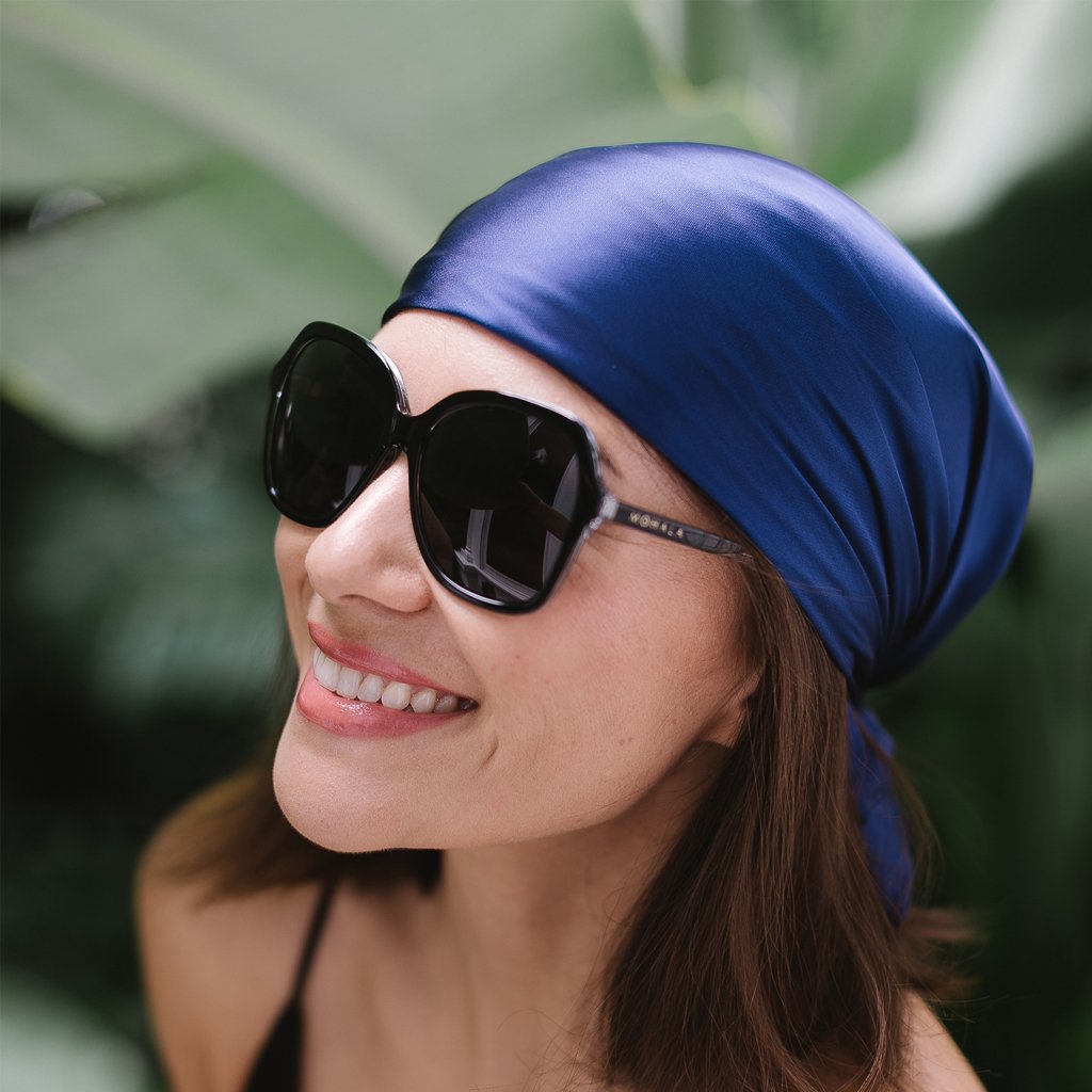 visible:Krista has an oval face, med nose bridge and face width, light skin with neutral undertones #color_Black Lava with Polarized Gray Lenses