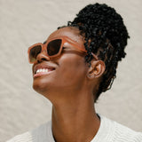 visible:Channel has a oval face shape, wide face width, low nose bridge:black #color_Pink Papaya with Polarized Tan Gradient Lenses