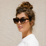 visible:Jordyn has a square face shape, med width, tall nose bridge:black #color_Sienna Tortoise with Polarized Tan Lenses