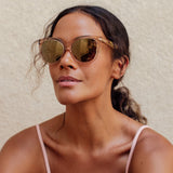 visible:Aloha has a long face, med nose bridge, narrow face width, deep skin with neutral undertones #color_Guava Mimosa with Orchid with Polarized Gold Mirrored Lenses