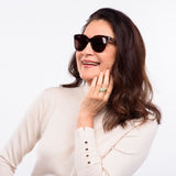 visible:Kanoe has a square face, low nose bridge, med face width, light skin with warm undertones:black #color_Amber Tortoise with Polarized Tan Lenses